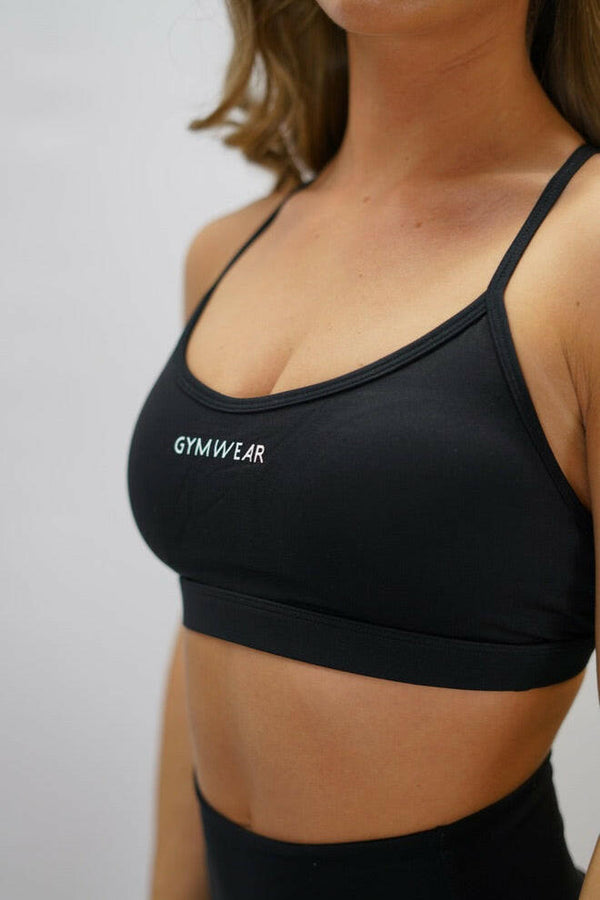 Svart blå Zoe Premium Sport Bra - premium sport-bh med korsade band bak och Gymwear-logga fram