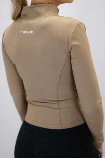 Brun Nalia Performance Long Sleeve Zipper Top - långärmad funktionströja med hel dragkedja, tumhål och Gymwear-logga i nacken