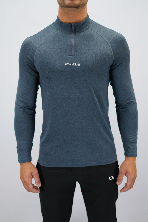 Blågrå Eiden Long Sleeve Half-Zip Top - funktionsmaterial långärmad träningströja med halvdragkedja och Gymwear-logga på framsidan
