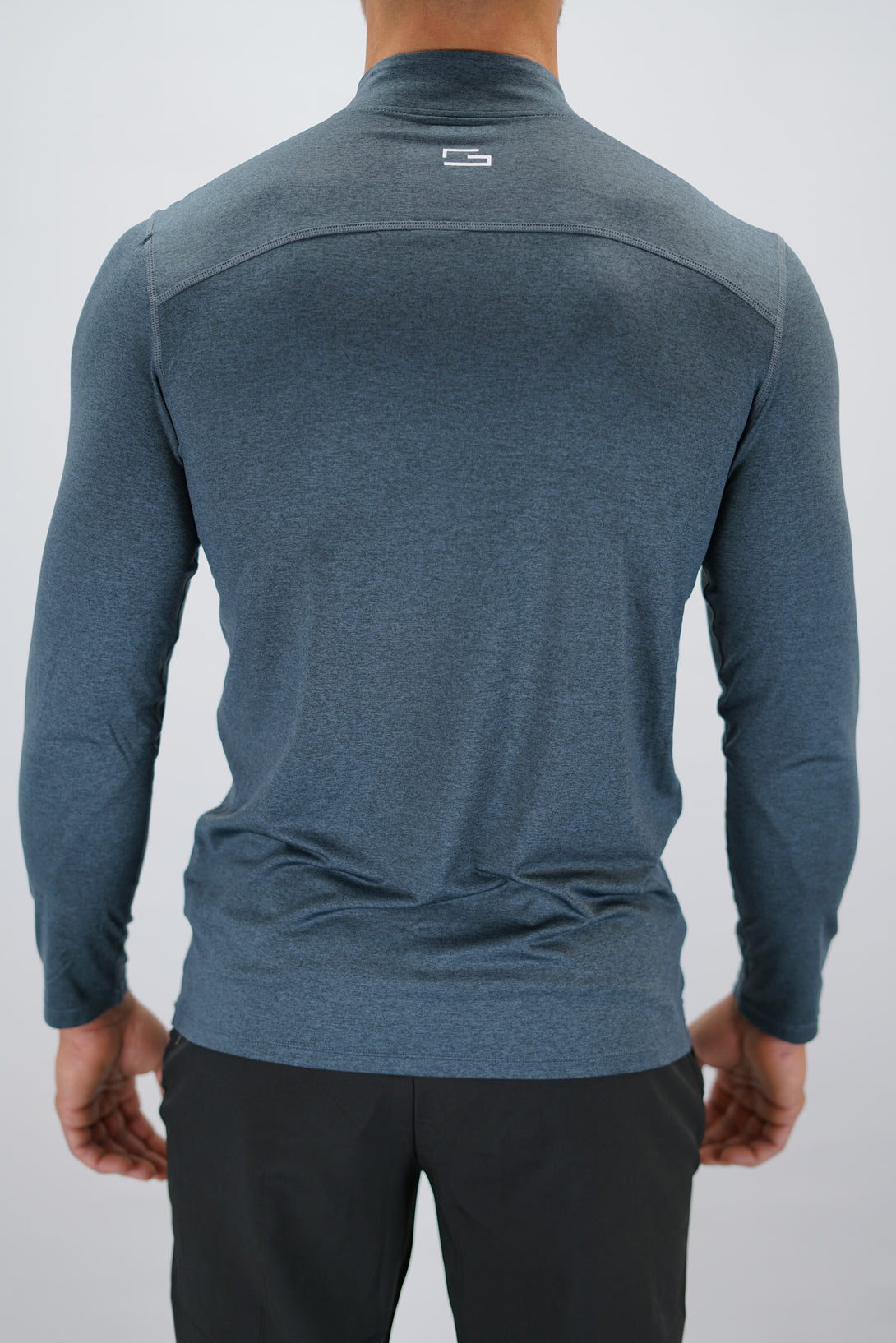 Blågrå Eiden Long Sleeve Half-Zip Top - funktionsmaterial långärmad träningströja med halvdragkedja och Gymwear-logga på framsidan