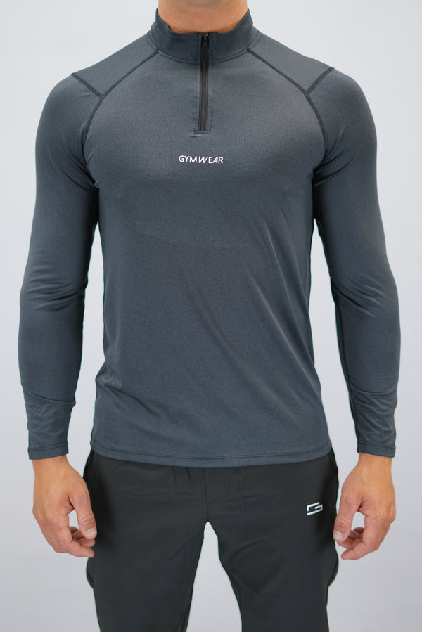 Svart Eiden Long Sleeve Half-Zip Top - funktionsmaterial långärmad träningströja med halvdragkedja och Gymwear-logga på framsidan