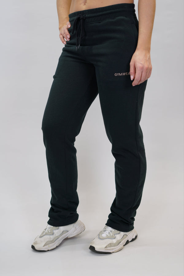 Träningsbyxor för dam i borstad bomull svarta med Gymwear logga på vänster lår nedanför fickan, dragsko och elastisk midja