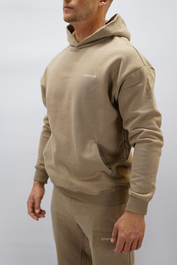 Z-2 Hoodie i brun färg, borstade bomull med GYMWEAR logga på vänster bröst. Snygga diskreta fickor.