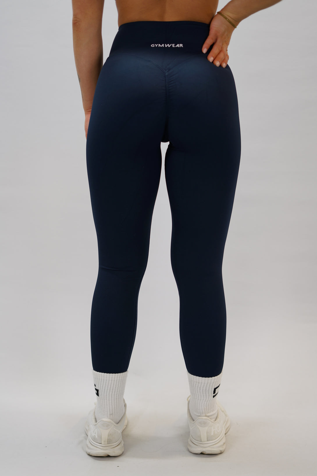 Marinblå Zoe Invisible Scrunch Tights - tränings leggings med diskret scrunch-detalj, G-symbol på vänster ben och Gymwear-logga bak